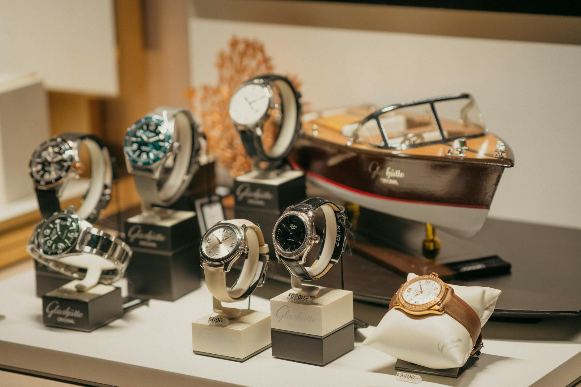 A collection of luxury watches elegantly displayed in a retail setting