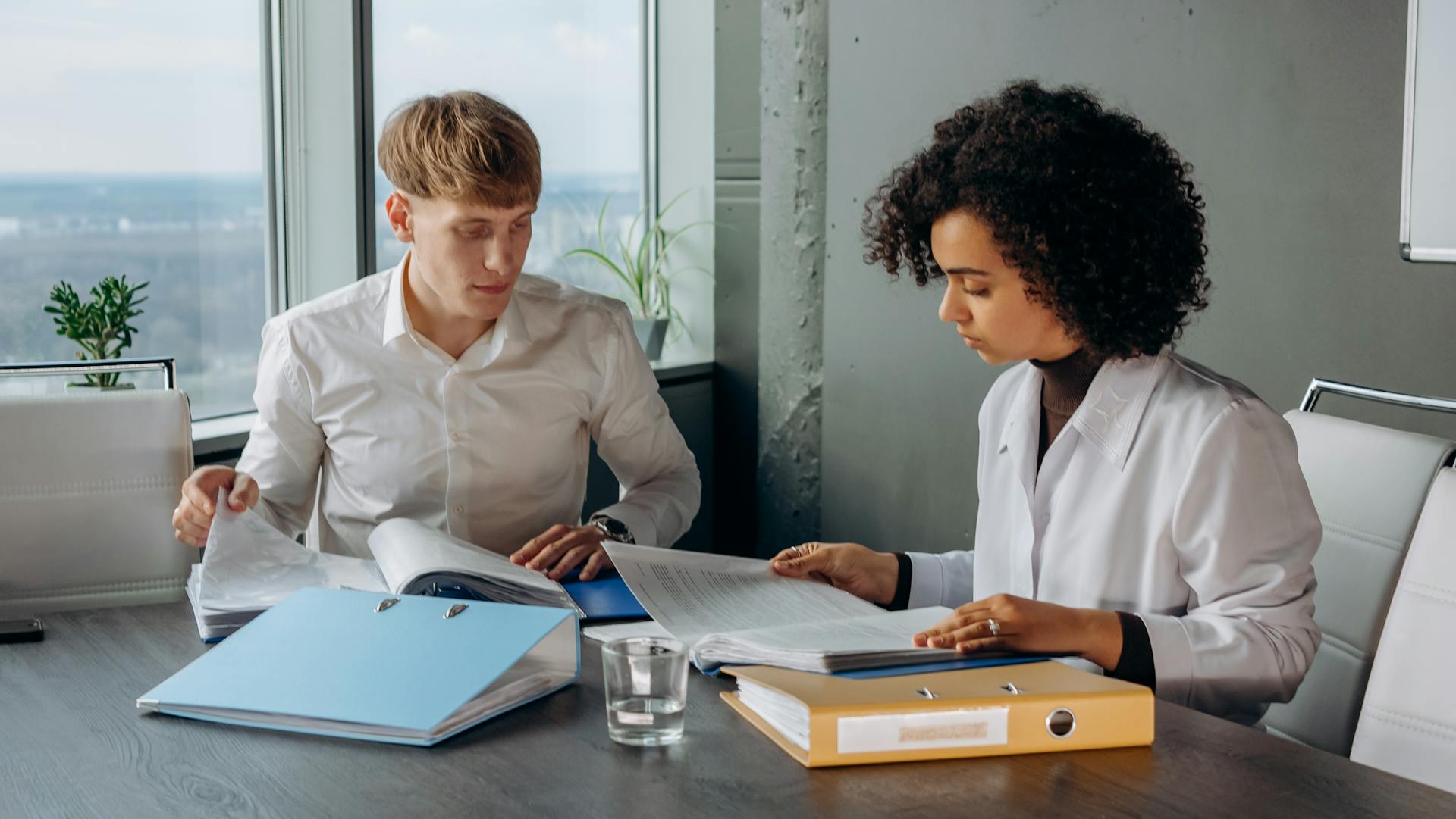 Professionals reviewing a financial report together