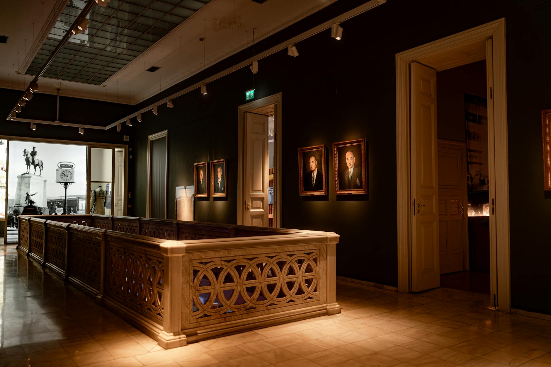 Classic art gallery interior with portraits and sculptures